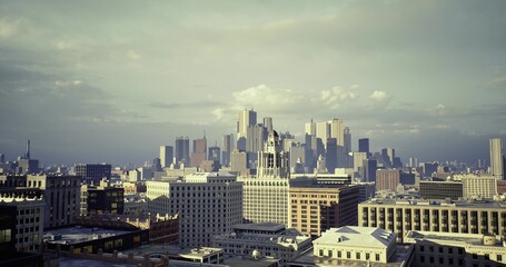 Obraz premium city skyline in soft morning fog with muted tones and gentle diffusion, quiet rooftops, softened edges, serene atmosphere for calm lifestyle and wellness