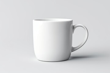 Obraz premium White ceramic mug standing on a seamless light gray background