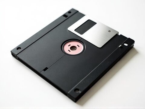A floppy disk sitting on a clean white table, ready for use