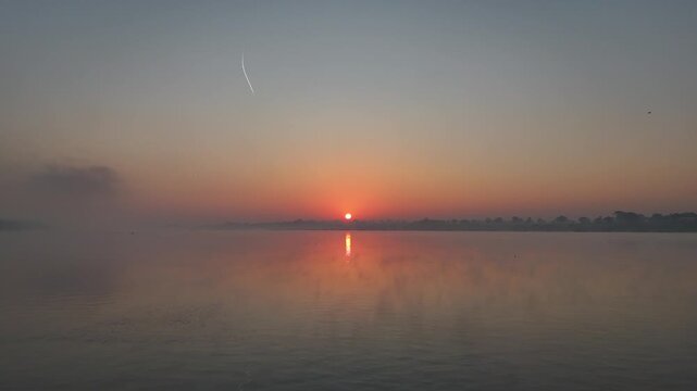 Beautiful golden Sunrise at River Narmada in Maheshwar Madhya Pradesh, India
