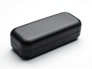 A black case sitting on a white surface, ideal for showcasing electronic devices or as a decorative accent