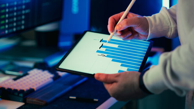 Business data analysis tablet bar chart visual notes