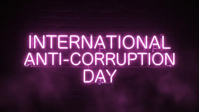 International Anti-Corruption Day neon sign on dark brick wall