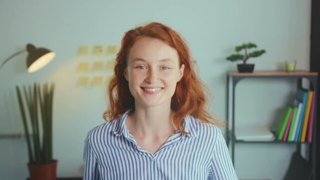 Approachable woman delivering positivity, Smiling woman exuding confidence and openness in professional setting