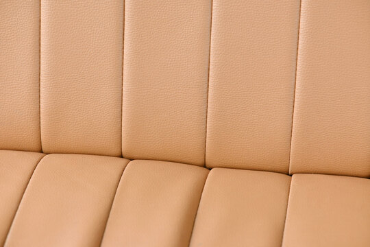 Soft beige leather texture with vertical stitching detail