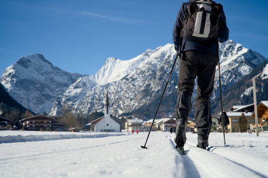 Cross-Country Ski Trail Through Snowy Alpine Valley in Pertisau, Achensee, Tirol, with Karwendel Mountains