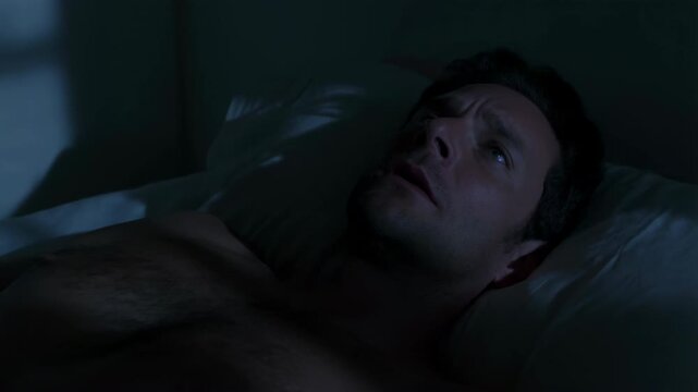 Sleeper Confronts Hidden Anxieties Alone. Man Contends With Silent Worries During Endless Night Hours