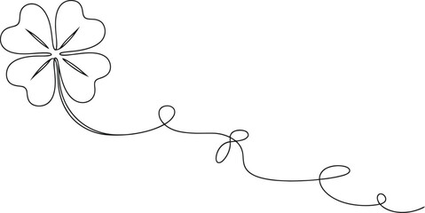 Sparkling four leaf clover with a delicate swirling ribbon on a white background