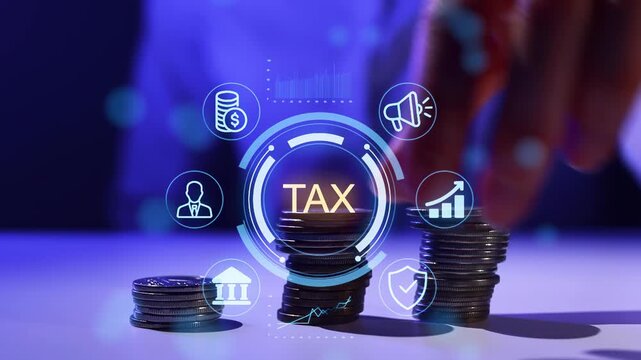 Hands placing coins on a table with tax icons and symbols in a digital display showing finances and money management.