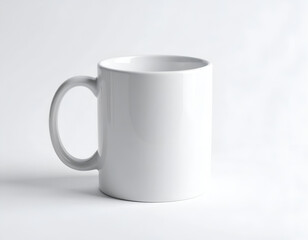 Obraz premium White ceramic drinking mug on a clean white backdrop