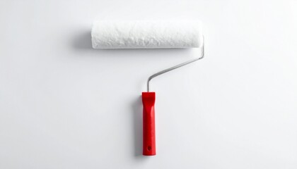 Obraz premium Paint Roller with Red Handle on White Background Studio Shot Minimalist Image Perfect for DIY or Home Improvement Projects.
