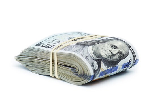 Folded US hundred dollar bills isolated on white background