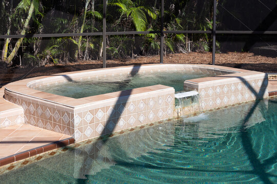 Hot tub flowing into swimming pool