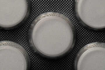 White pills in blister pack macro still life
