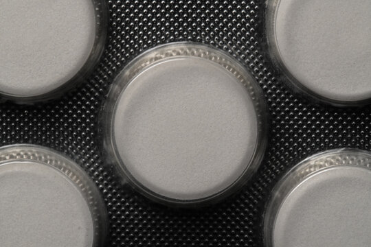 White pills in blister pack macro still life