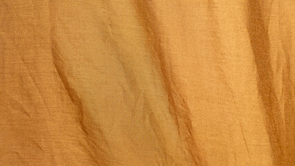 Brown Cotton Fabric with Minimal Texture Wrinkles. Ideal for Design Backgrounds and Textile-Based Illustrations.