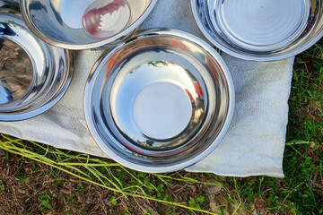 Stainless steel mixing bowls and plates