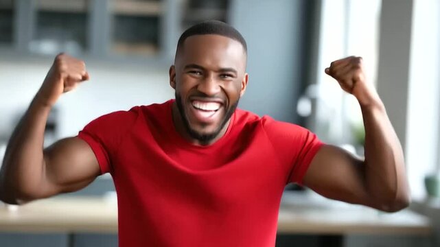 Man in red shirt expressing determination indoors, fitness motivation for training, athletic mindset display, workout dedication moment, exercise commitment scene, strong mental