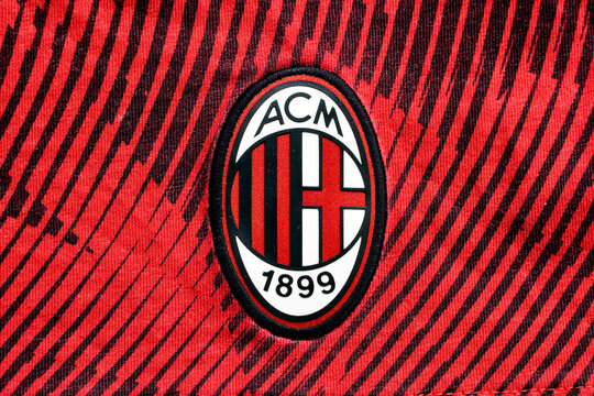 The Logo of AC Milan (Associazione Calcio Milan) Football Club on the red and black striped jersey - Poland - February 18, 2026