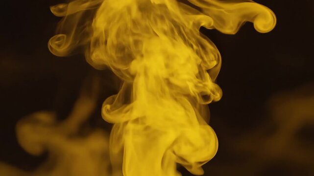 Abstract Yellow Smoke Cloud Explosion Effect on Black Background.