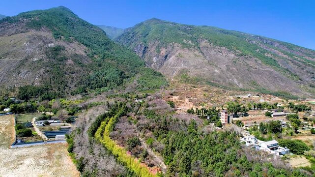Mountain Valley with River and Settlement Aerial View