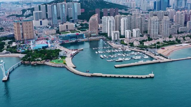Dalian Xinghai Bay Marina Aerial View with Yachts and City Skyline