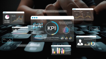 Hands typing on keyboard with interface displaying KPI analytics, graphs, metrics, and data...