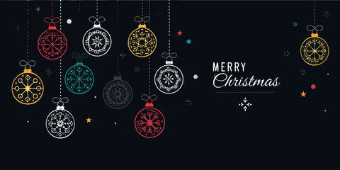 Colorful christmas ornaments hanging against a dark festive background © Ranajit
