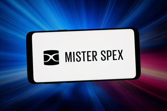 Stuttgart, Germany - 03-04-2026: In this photo illustration, the logo of German optics company Mister Spex SE is displayed on a smartphone in front of abstract background on computer screen.