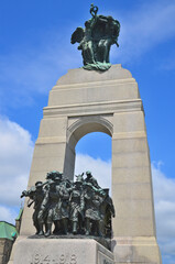 Obraz premium OTTAWA QUEBEC CANADA. The National War Memorial , is a tall granite cenotaph with acreted bronze sculptures, that stands in Confederation Square,