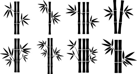 Fototapeta premium Collection of black bamboo stalk with leaves a white background stalks
