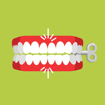 Chattering teeth toy with silver wind up key on green background flat vector illustration for dental humor or classic windup clockwork novelty joke art