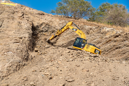 Excavator in operation for building foundations in the city of Mindelo, S&atilde;o Vicente, Cape Verde.