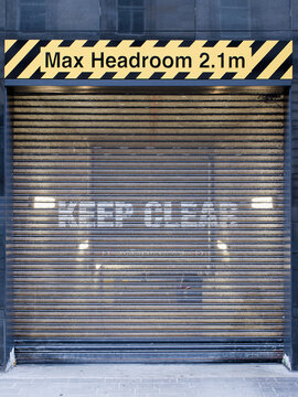  Height restriction sign at building delivery entrance