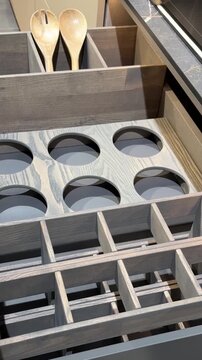 Modern kitchen drawer with organized compartments for utensils and cooking tools