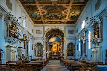 Obraz premium Grand church interior shows detailed architecture and religious art during the day with sunlight pouring through windows in Piran, Slovenia