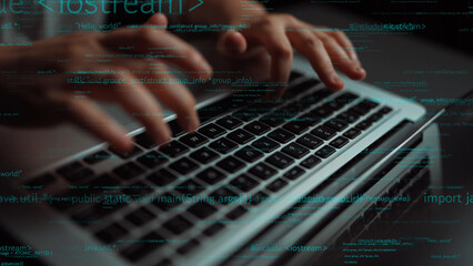 A dynamic image showing hands actively typing on a sleek laptop keyboard, surrounded by floating...