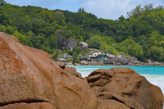 Granite boulders on a deserted tropical beach in Mahe, Seychelles, on the Indian Ocean