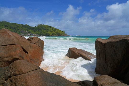 Granite boulders on a deserted tropical beach in Mahe, Seychelles, on the Indian Ocean