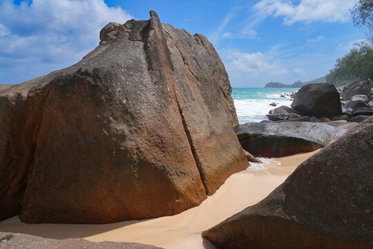 Granite boulders on a deserted tropical beach in Mahe, Seychelles, on the Indian Ocean