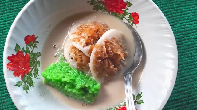 Special Serabi Ngampin from Ambarawa, Cental Java, Indonesia. Typical indonesian food with a sweet taste. Footage.
