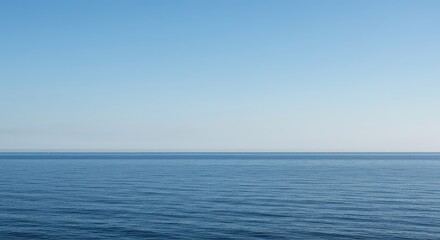 A minimalist scene depicting the endless ocean meeting a clear, featureless sky at a perfectly straight horizon line, nature, horizon, atmosphere