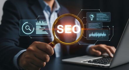 Fototapeta premium Business professional analyzing seo metrics on a laptop with a magnifying glass