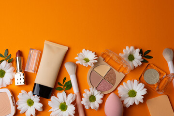 Makeup cosmetics and flowers on pastel background top view. Spring, new products, updates. place for text © Fotomoment001