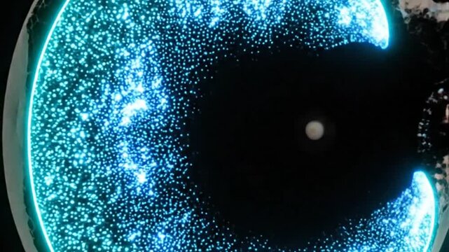 Abstract glowing blue energy sphere surrounded by a cellular structure on a dark background dynamic motion