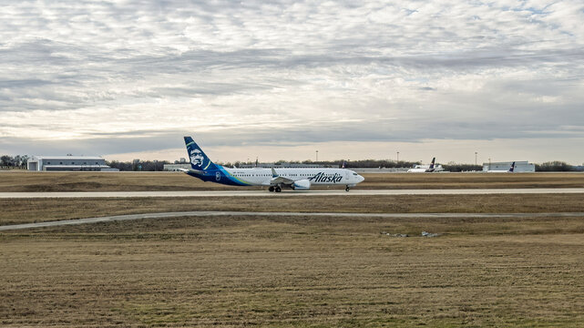 An Alaska Airlines airplane on the ground at Nashville International Airport (BNA). There is copy space in the image.
