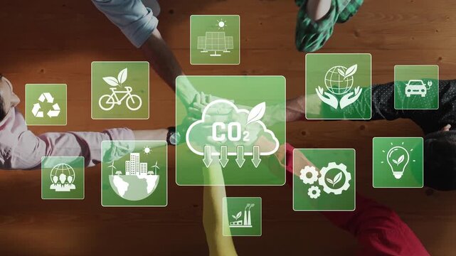 Aerial view of hands reaching for icons representing green technology and eco-friendly initiatives, emphasizing sustainability and the importance of reducing carbon footprint. Raster