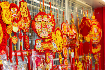 the moment traditional Lunar New Year ornaments sway gently in the breeze