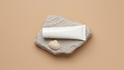 White cream tube on stone lotion skincare product.