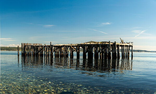 USA, WA, Whidbey Island.  Old fish processing plant pier.